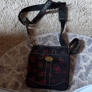 Dooney & Bourke Black Crossbody with Pink Logo Print and Branded Strap